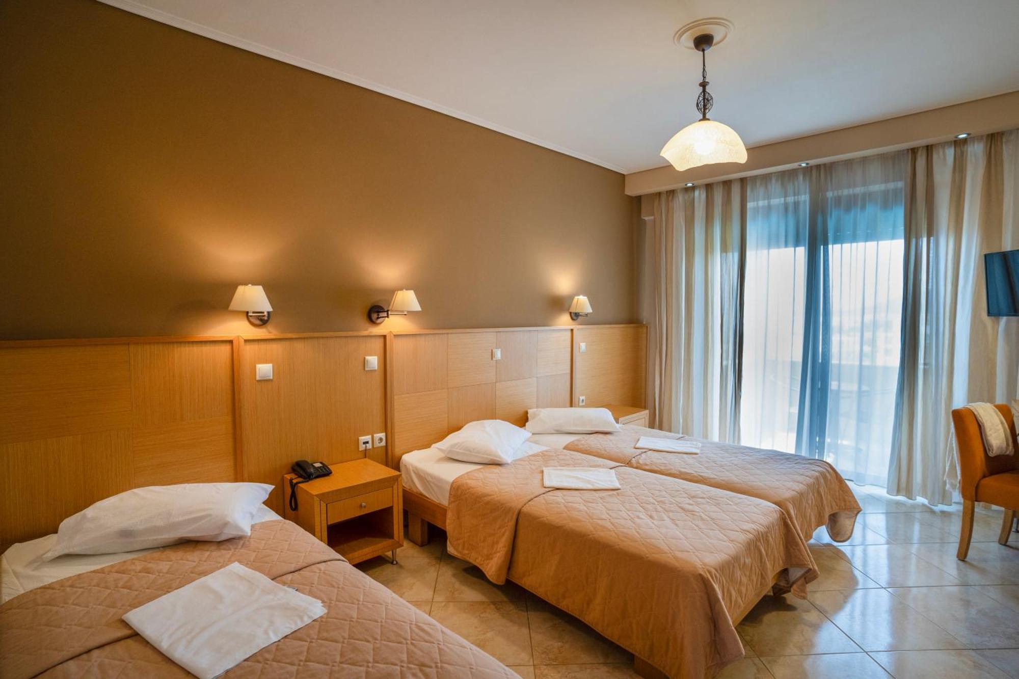 Evia Hotel & Suites Marmari  Bagian luar foto